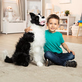 Border Collie Dog Giant Stuffed Plush by Melissa and Doug with Boy